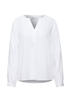 Blouse blanche à manches longues, décolleté en V et coupe ample. Fabriquée en tissu léger avec des poignets avec fronces et un ourlet droit.