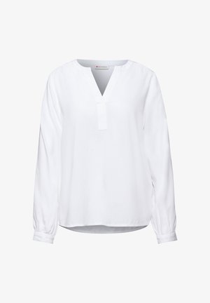 White blouse with long sleeves, V-neckline, and a loose fit. Made from lightweight fabric with gathered cuffs and a straight hem.