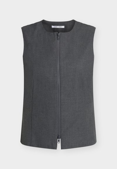 Veste sans manches gris foncé avec fermeture éclair à l'avant, encolure ronde et coutures latérales légères, présentée sur un fond clair uni.
