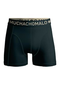 Fekete boxer alsónadrág, testhez simuló dizájnnal, sima anyagból. Kontrasztos bézs logós derékpánttal és kiemelt varratokkal rendelkezik.