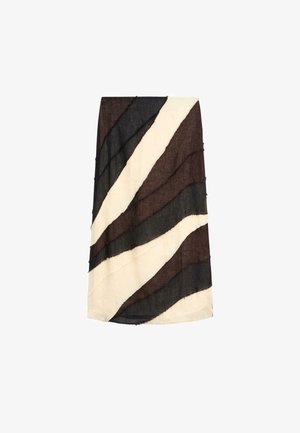 Knælængde nederdel med diagonale bølgede striber i brune, sorte og off-white farver på et tekstureret stof.
