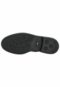 Sorte skosåler med runde gummi grips, struktureret overflade og et rektangulært mærke logo detaljer. Glatte kanter og solidt design.