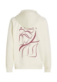 Kremfarget hettegenser med en stor kengurulomme foran, med en burgunder abstrakt blomstergrafikk på baksiden. Mykt bomullsmateriale.