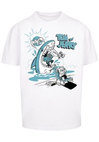 White cotton t-shirt featuring a cartoon graphic of a shark and Tom and Jerry, with blue and black colors, playful design elements, and beach theme.