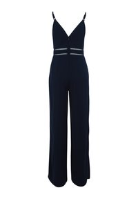 Combinaison bleu marine avec jambes larges, bretelles ajustables et décolleté en V. Présente des accents métalliques à la taille pour plus de détail.