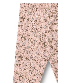 Blumen-Leggings aus hellrosa Stoff, mit einer Mischung aus blauen und weißen Blumen sowie grünen Blättern, elastischem Bund und weichem Material.