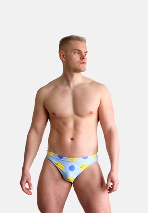 Blaue Schwimmbriefs mit gelbem Gummienten- und Pünktchenmuster, enganliegendes Design, dehnbares Material und kontrastierende Farben im Bund.