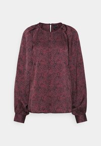 Bluzka z długim rękawem w ciemnoróżowym kolorze z fakturowanym wzorem w węża, z okrągłym dekoltem i subtelnym zamkiem z tyłu.