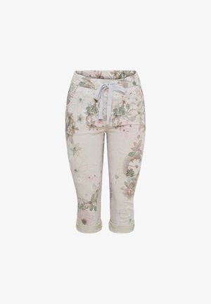 Lyse beige kortbukser med op rullede manchetter, blomsterprint i dæmpet pink, grøn og brun, og hvid snøre til at binde i taljen.