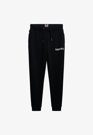 Pantaloni jogger neri realizzati in tessuto morbido, dotati di una vita elastica con cordino, due tasche laterali e un logo bianco sulla coscia.