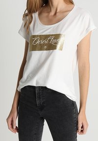 Cream T-shirt con stampa - off-white