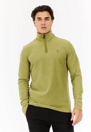 Lys grøn fleece pullover med en kvart lynlås krave, lange ærmer og logo detalje på brystet. Blødt, struktureret materiale.