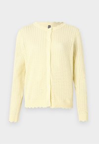 Κίτρινη πλέκω κάρντιγκαν με υφή, στρογγυλή ραφτή λαιμόκοψη και κουμπί. Ριμπ μανσέτες και στρίφωμα με ραφτές άκρες.