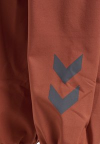 Hummel HMLJUPITOR TEX MINI - Regnbukser - copper brown