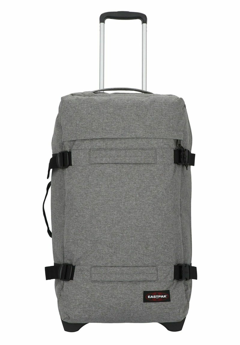 Borsa da viaggio a sacca grigia, con due manici superiori, cinghie regolabili e un robusto manico telescopico. Presenta una tasca frontale e un patch con il logo.