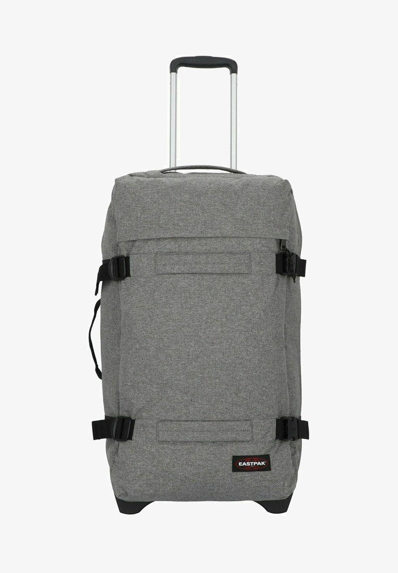 Borsa da viaggio a sacca grigia, con due manici superiori, cinghie regolabili e un robusto manico telescopico. Presenta una tasca frontale e un patch con il logo.