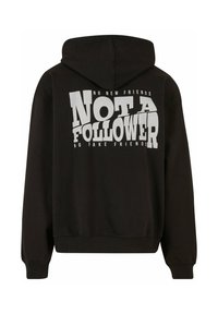 Sweatshirt à capuche noir avec un texte graphique au dos. Le texte inclut "PAS UN SUIVEUR" et "PAS DE NOUVEAUX AMIS", en blanc avec une typographie audacieuse.