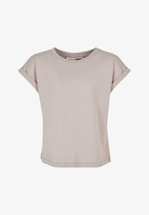 Camiseta de manga corta color beige claro con un corte relajado, escote redondo y puños enrollados. Tejido suave con un acabado ligeramente texturizado.