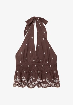 Brun halterneck-top lavet af stof, med hvid blomsterbroderi og smocket talje samt en bølget kant og bindebånd ved halsen.