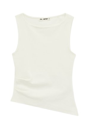 Haut blanc sans manches avec ourlet asymétrique, encolure bateau et étiquette de marque cousue à l'intérieur de l'encolure.