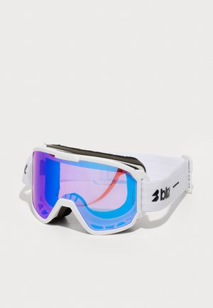 White ski goggles with a curved purple-tinted lens, black foam padding, and an elastic strap featuring a logo. Ventilation openings on the frame.