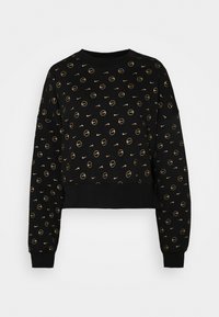 Black cropped sweatshirt featuring a gold circular pattern and Nike logos, with long sleeves and a ribbed hem and cuffs.