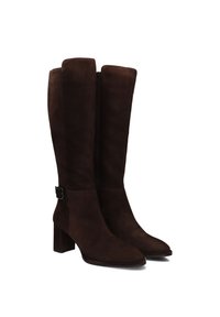Brown suede knee-high boots with a block heel. Features a side zipper and a decorative buckled strap on the ankle.