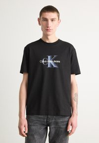Calvin Klein Jeans - MONOLOGO SHIFT TEE - Print T-shirt - black Thumbnail Image 1