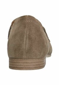 Suede shoes in light brown with a smooth texture, featuring a rounded back and a low, ridged sole. Simple design with minimal hardware.