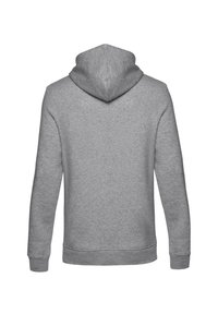 Felpa grigia con cappuccio, caratterizzata da una texture morbida, maniche lunghe e un orlo a coste. La vista posteriore rivela un design semplice e uniforme.