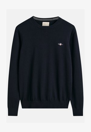 Maglione di cotone blu navy con scollo a giro classico, polsini e orlo a costine. Presenta un piccolo logo ricamato sul petto.