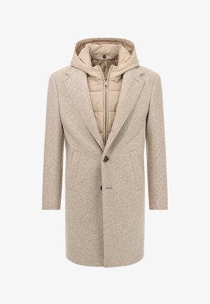 Beigen värinen villa-sekoiteinen takki, jossa on tikattu, beigen värinen hupullinen sisäkerros. Ominaisuuksiin kuuluu istuva leikkaus, kaksi etutaskua ja yksittäinen napitus.