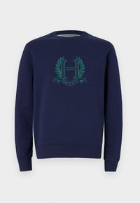 Navy blue sweatshirt made of cotton, featuring a raised green logo with an “H” and laurel accents. Classic crew neck and fitted cuffs.