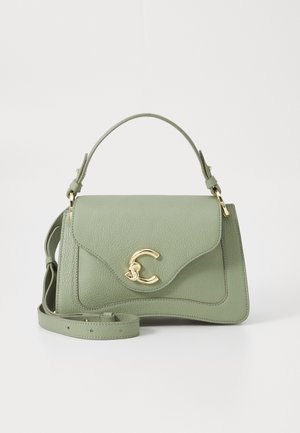 Green leather handbag with a structured shape, featuring a gold-tone metal clasp and a removable shoulder strap. Textured finish.