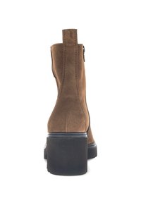 Brown suede ankle boot with a block heel, featuring a side zipper, rounded toe, and visible stitching detail on the back.