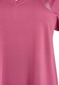 Pink short-sleeve shirt with a v-neckline, smooth texture, and a subtle patterned accent in white on the upper left.