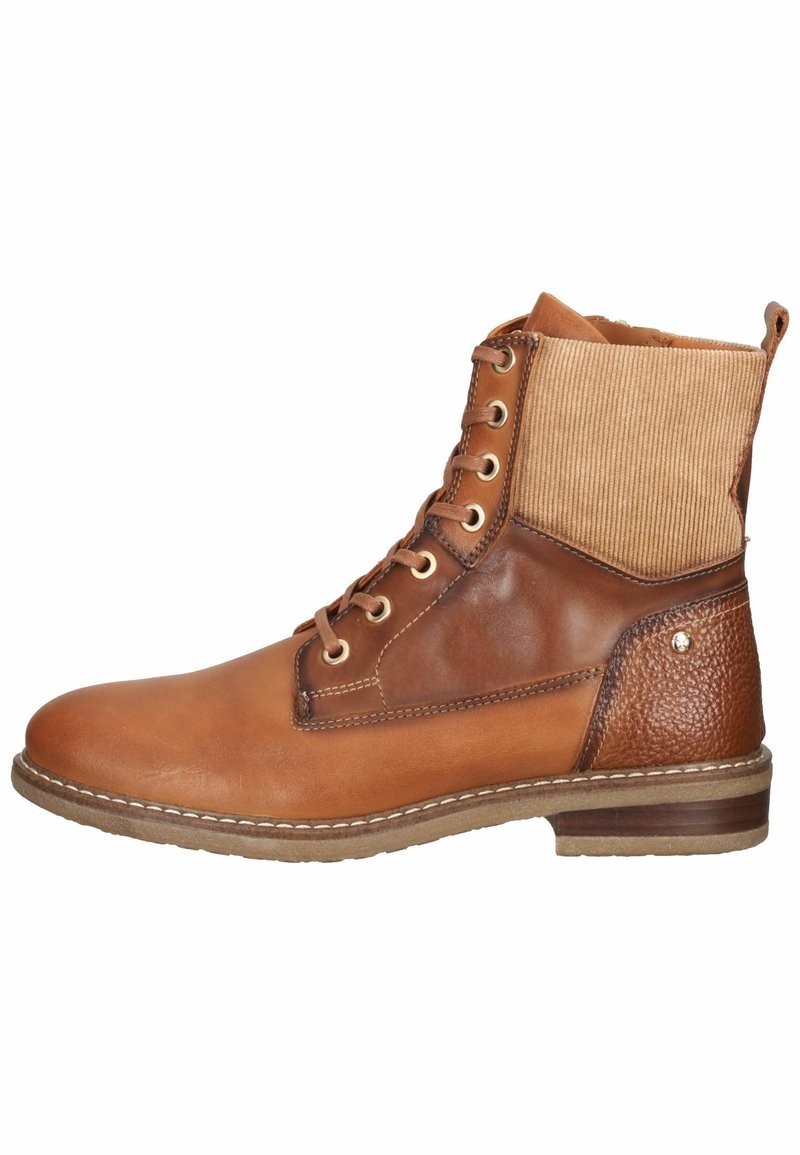 Bottine marron en cuir pour homme avec col supérieur en velours côtelé beige et patch texturé au talon.