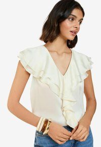 REGULAR FIT-SHORT SLEEVE RUFFLE - Bluse - neutral