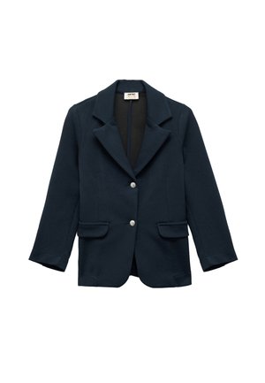 Mørkeblå blazer lavet af et glat stof, med en klippet krave, to forlommer og sølvknapper. Lange ærmer med manchetter.