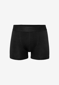 Svarta bomullboxer med en texturerad svart elastisk midjeresår som har ett präglat varumärke. Enkel design med en tajt passform.