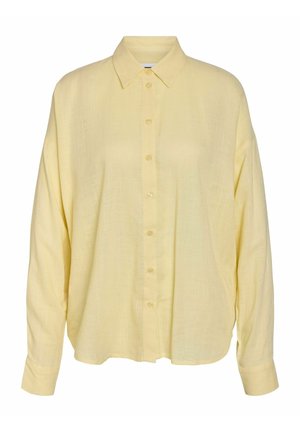 Gul skjorte med knapper laget av lett stoff. Har klassisk krage, lange ermer og en avslappet passform med synlig knappestolpe.