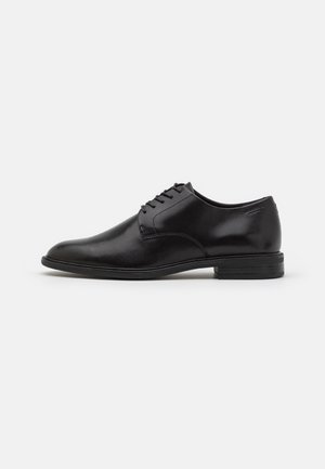 Vagabond Lace-ups - black