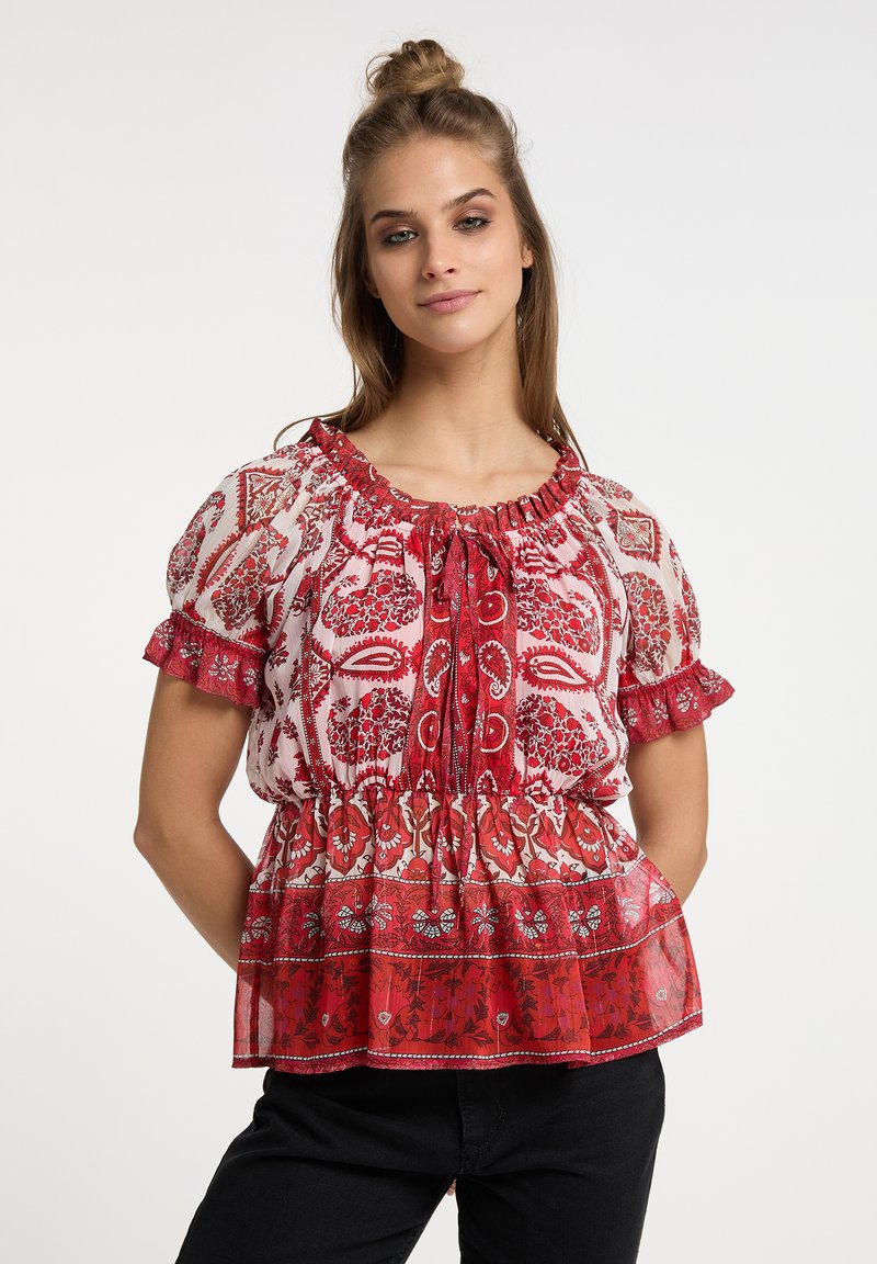 Rote Bluse mit floralem Muster, gepufften Ärmeln, elastischem Ausschnitt und einem Peplum-Saum. Hergestellt aus leichtem Stoff mit einer weichen Textur.