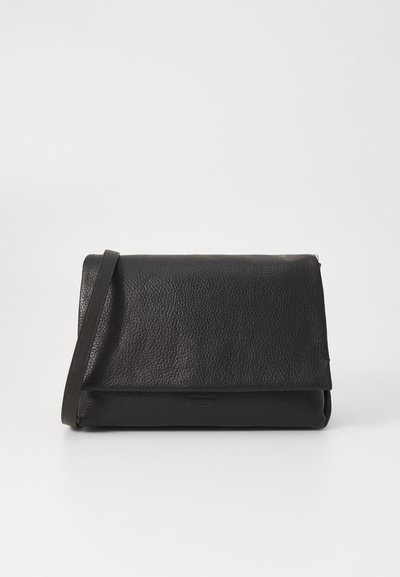 Black leather clutch bag with a textured exterior, a fold-over flap, and a slim shoulder strap, featuring minimalist design and no visible hardware.