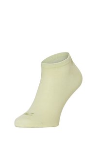 Lichtgroene enkel sok gemaakt van zacht, rekbaar materiaal. Heeft een ribbelrib en een verstevigde teen met een klein, groen logo.
