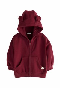 Haut de hoodie zippé bourgogne en tissu doux, avec une capuche ornée d'oreilles d'ours, des poches avant et des poignets et un ourlet côtelés.