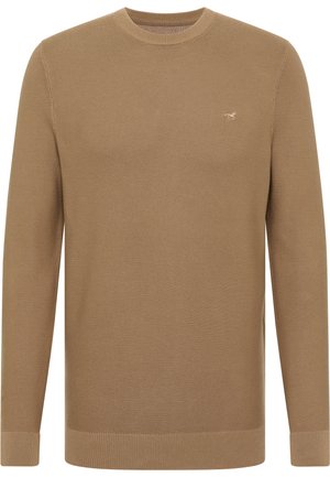 Beige stickad tröja med rund halsringning, långa ärmar, ribbade manschetter och fåll, med en liten logotyp på bröstet.