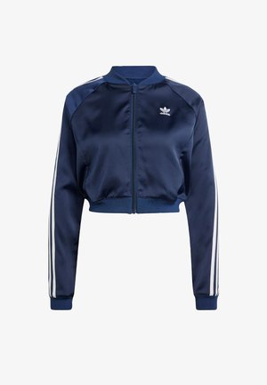 Navy satin bomber jacket with white three-stripe accents, ribbed cuffs and hem, front zipper, and an embroidered logo on the left chest.