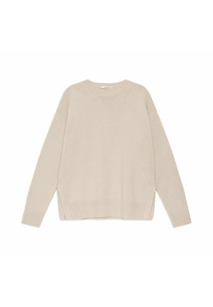 Pull tricot beige avec un col rond, manches longues, poignets et ourlet côtelés. Caractérisé par une coupe légèrement oversize et des fentes sur les côtés.
