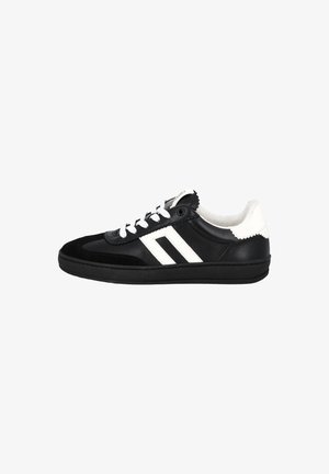 Black sneaker with white accents, suede and leather materials, round toe, flat rubber sole, and dual diagonal stripes on the side.